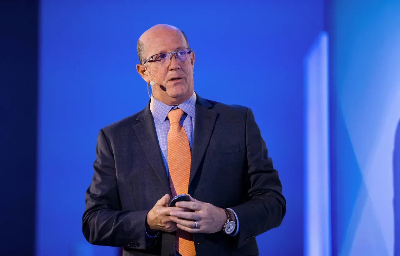 Man speaking at a conference